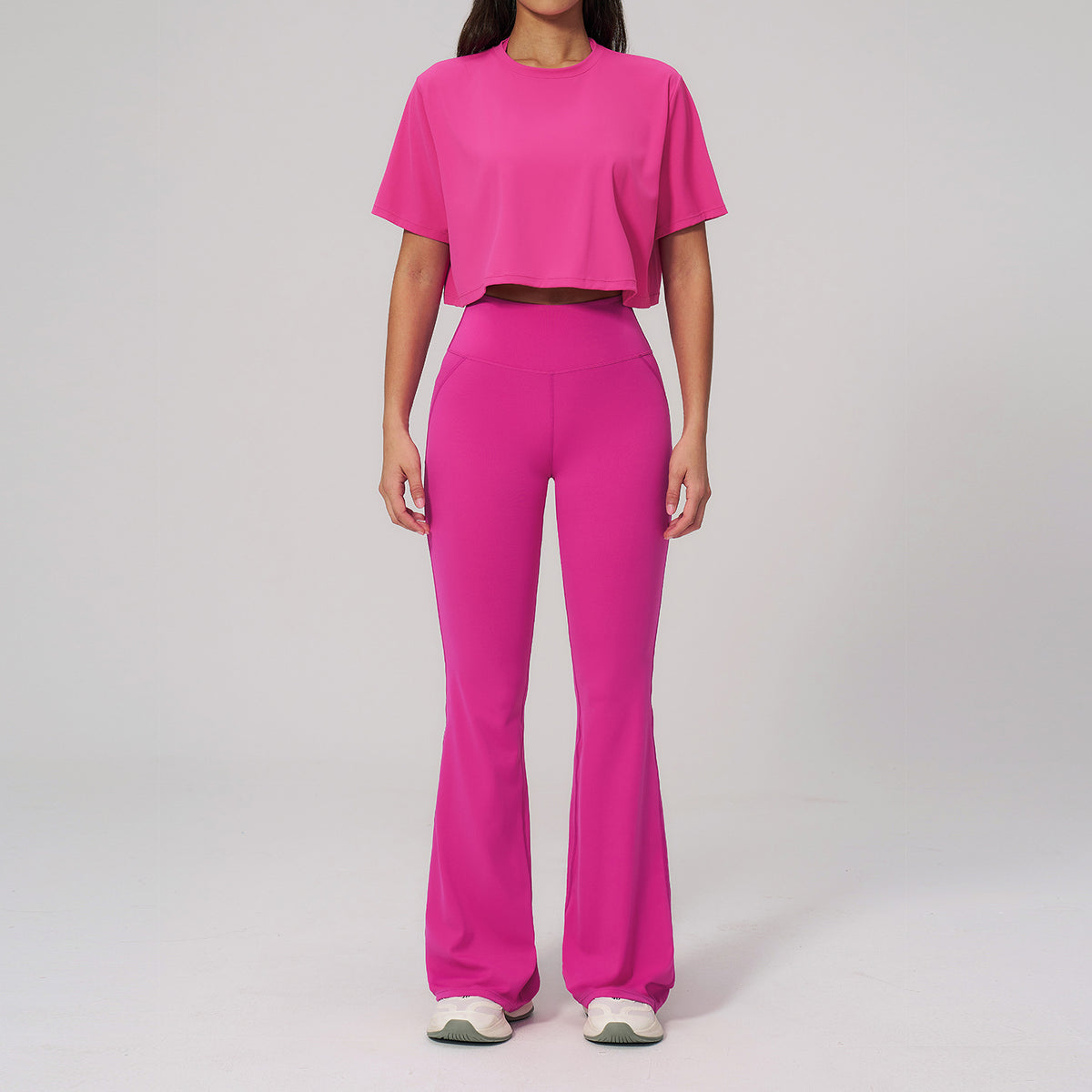 Conjunto de ropa deportiva entallada para mujer al por mayor