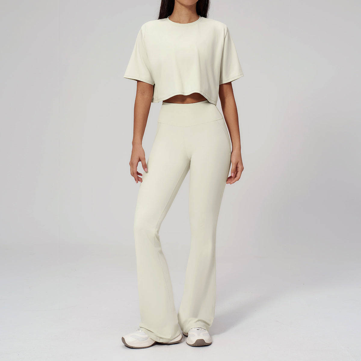 Conjunto de ropa deportiva entallada para mujer al por mayor