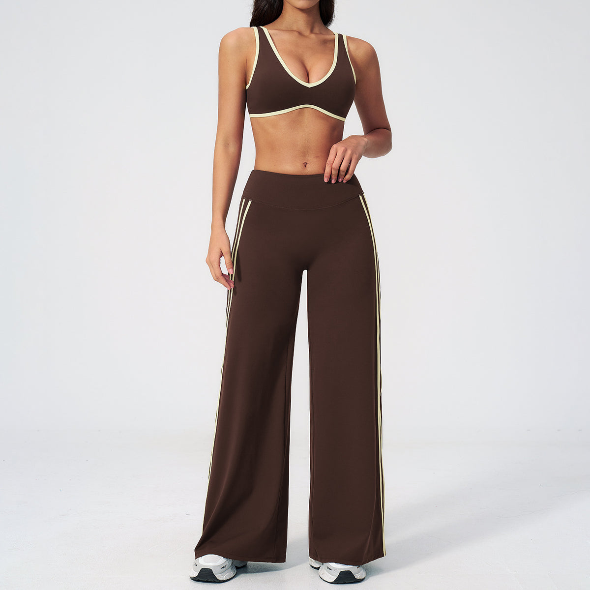 Conjunto de ropa deportiva entallada para mujer al por mayor