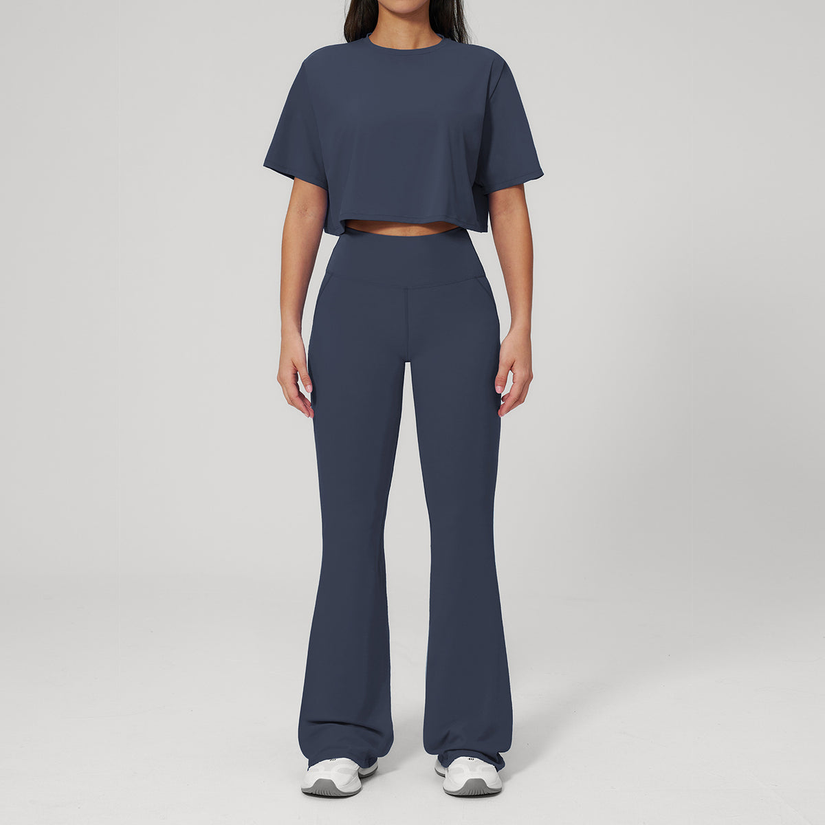 Conjunto de ropa deportiva entallada para mujer al por mayor