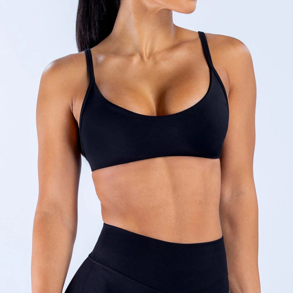 Top de ropa deportiva para mujer Lotus Motion al por mayor