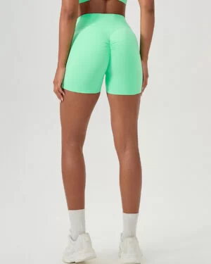 Wholesale Woman peach hip tight sports shorts